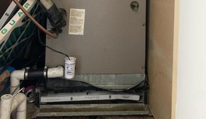 AC unit drain overflow cleanup service
