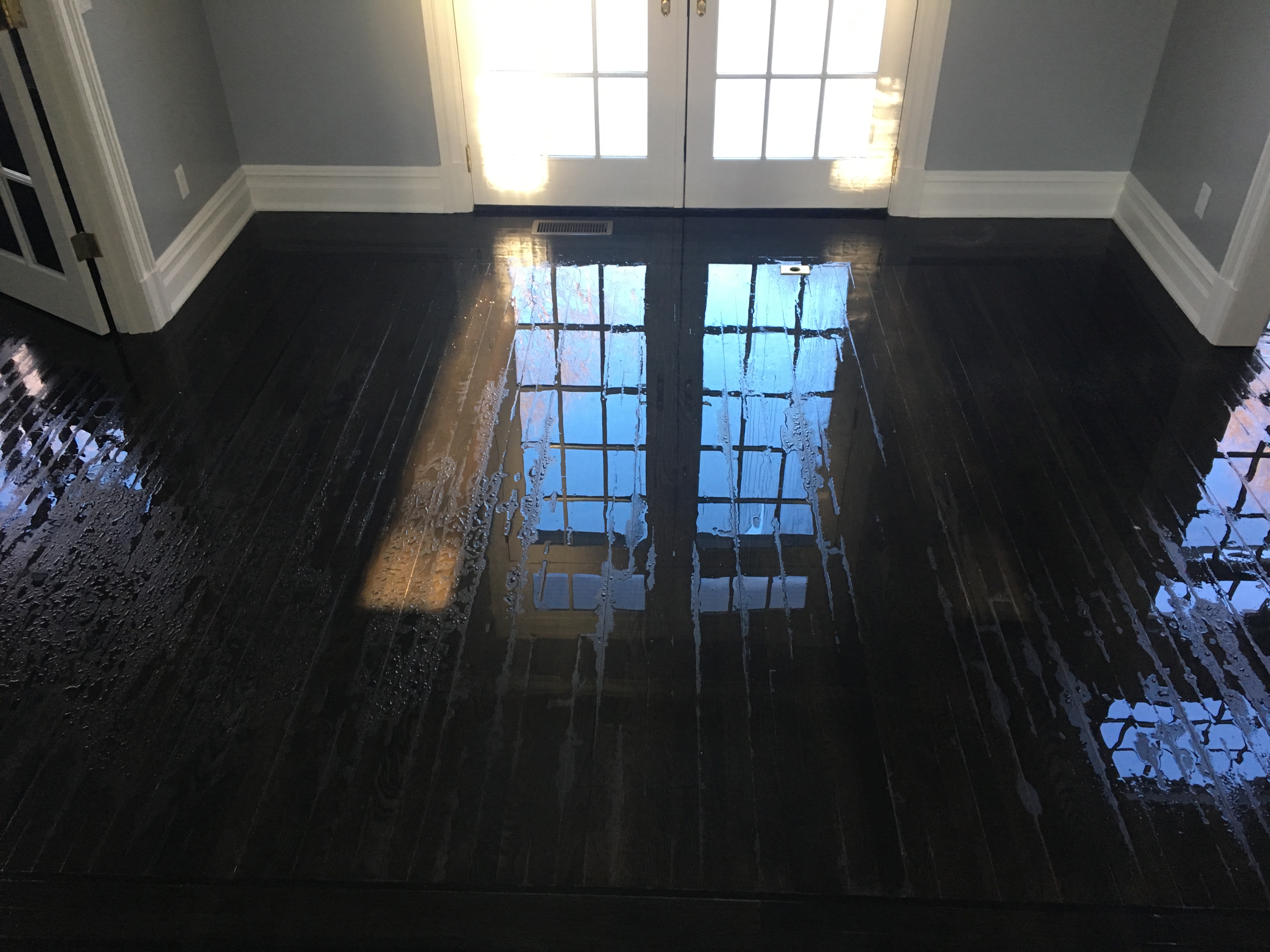 Water damage on wood floors.